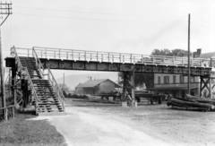 Die älteste bekannte Aufnahme des hölzernen Steges aus der Zeit um 1900 wurde ca. 1930 aufgenommen. Foto: Sammlung Arbeitskreis Eisenbahnhistorie Württemberg.